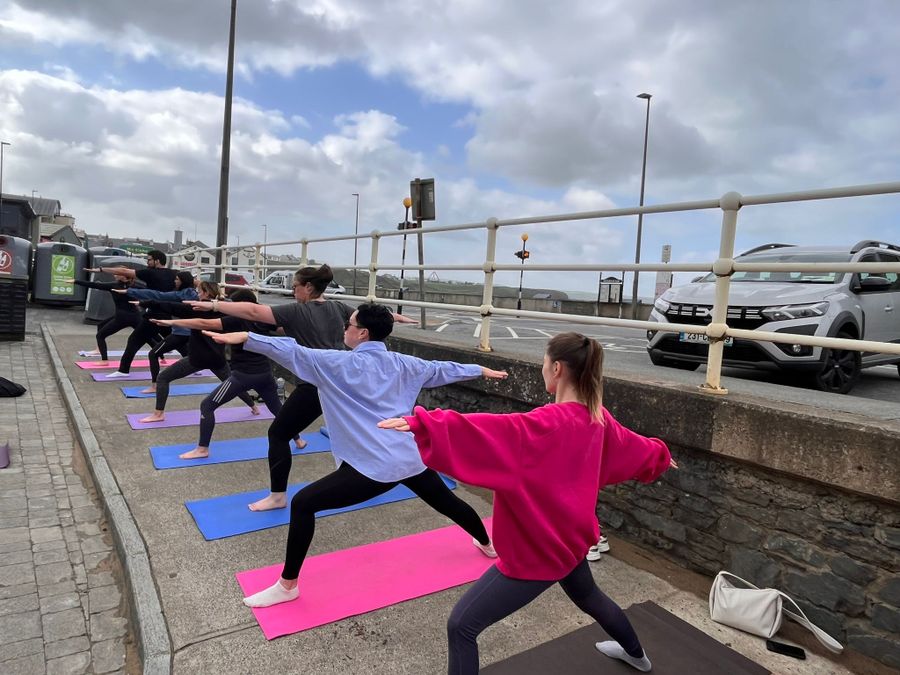 Group exercise class at company away day